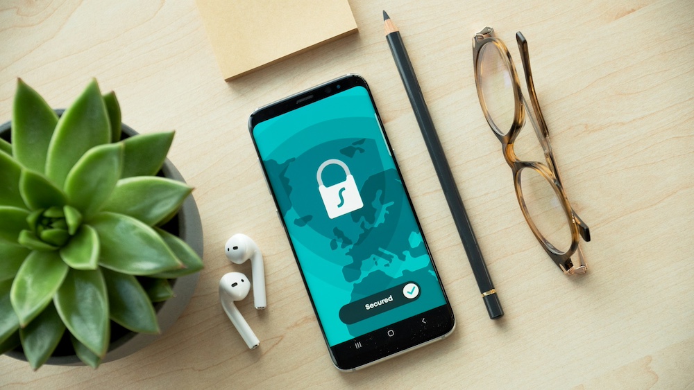 Phone with lock on the screen - Photo by Dan Nelson on Unsplash