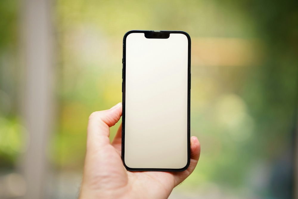 iPhone - Photo by Jakub Żerdzicki on Unsplash
